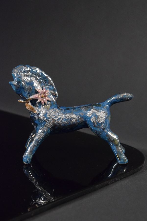 Pietro  Melandri - Cavallino blu con fiore