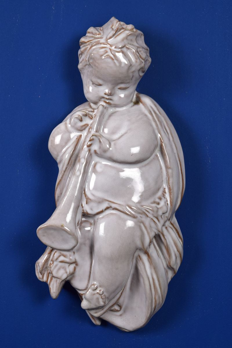 Putto musicante