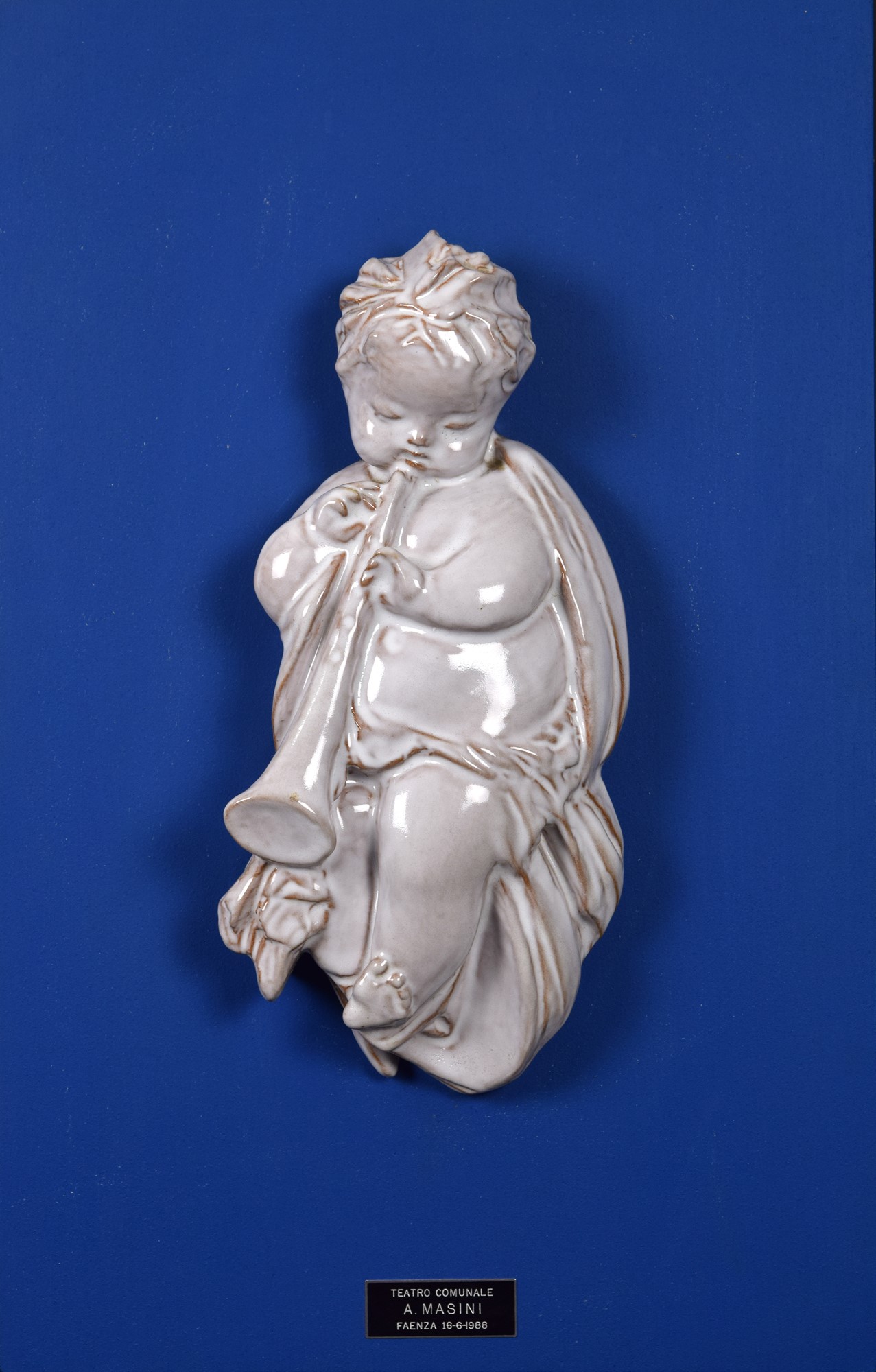 Putto musicante