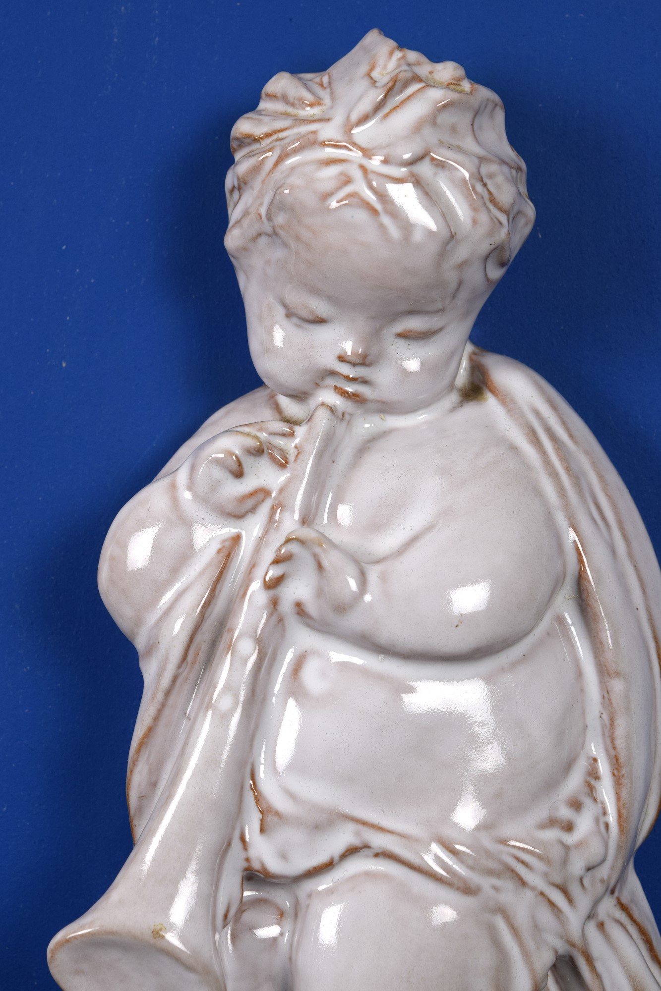 Putto musicante