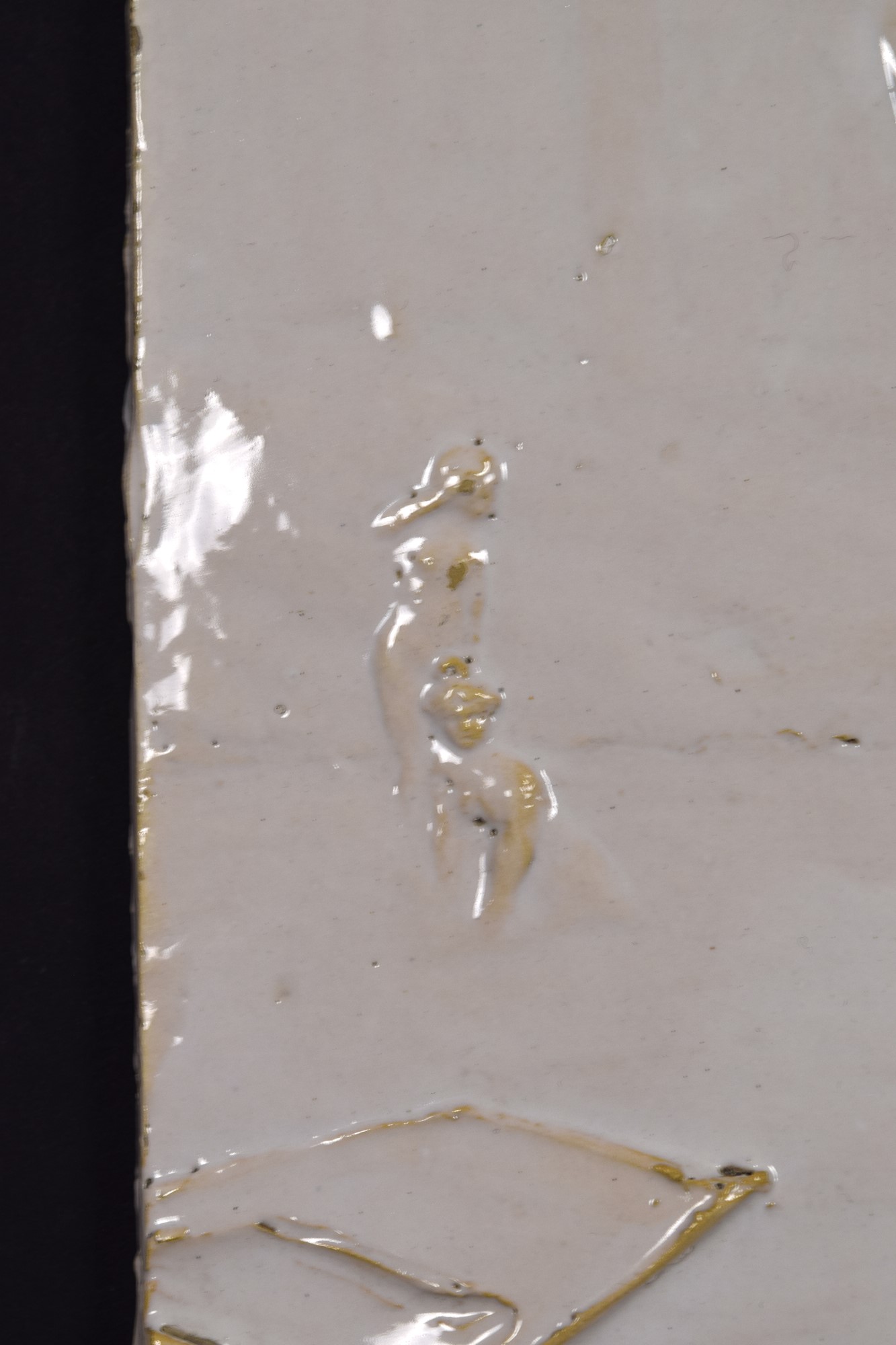 Piastra a bassorilievo con nudo femminile